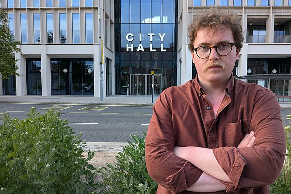 Ciaran Morrissey standing with his arms folded outside Sunderland City Hall