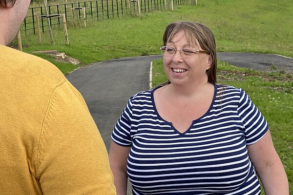 Councillor Heather Fagan talking to someone on Potters Hill