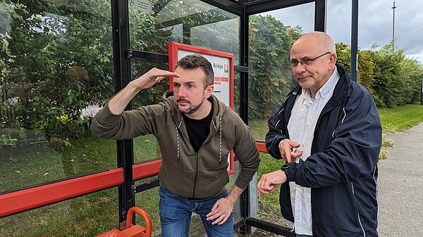 Martin and Steve waiting for the bus