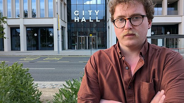 Ciaran Morrissey standing with his arms folded outside Sunderland City Hall